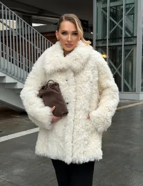 Белая шубка из тиградо - фото 17